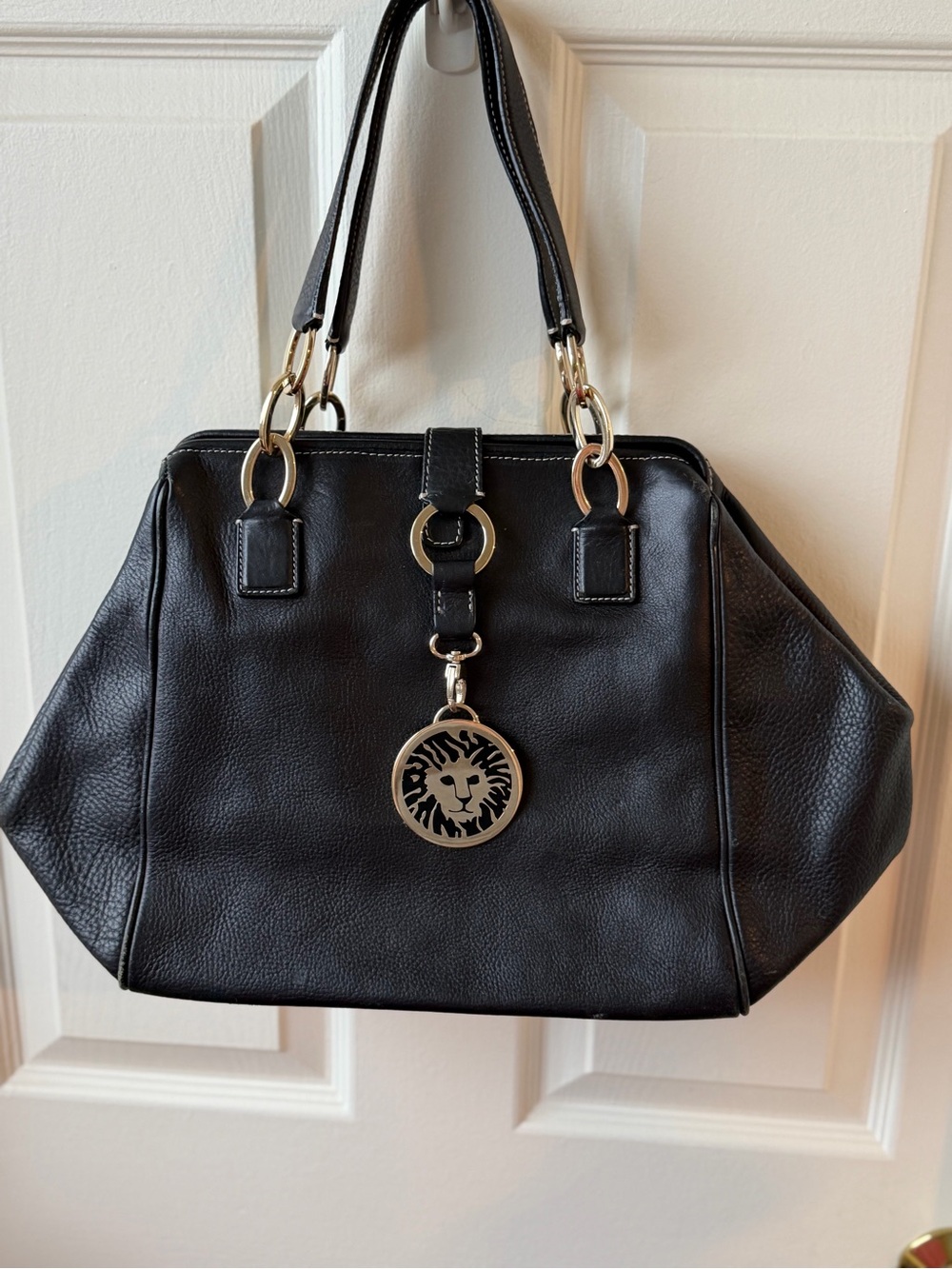 Anne Klein Black Leather Shoulder Tote with Gold Lion Medallion